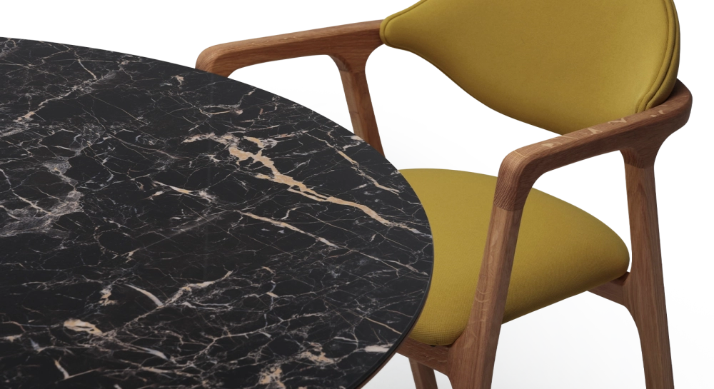 Round walnut and ceramic dining table for 4 to 6 people with a natural wood finish and a black m2 marble-effect ceramic top. 110x110 Round walnut and ceramic dining table for 4 to 6 people with a natural wood finish and a black m2 marble-effect ceramic top. 110x110