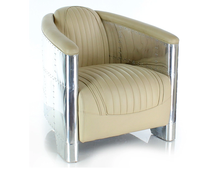 Fauteuil aviateur aluminium riveté et cuir beige Fauteuil aviateur aluminium riveté et cuir beige