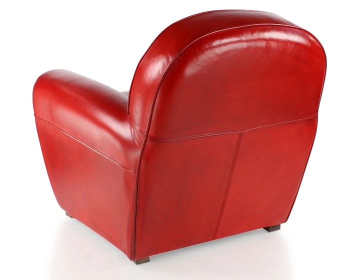 Leather club armchair red studded armrests Leather club armchair red studded armrests