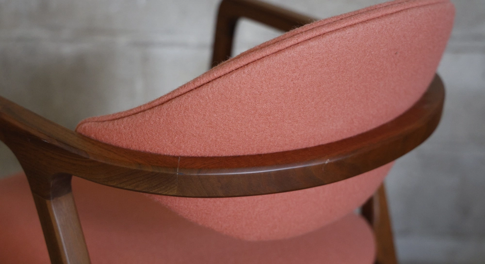 Walnut Designer armchair natural wood finish and brown fabric