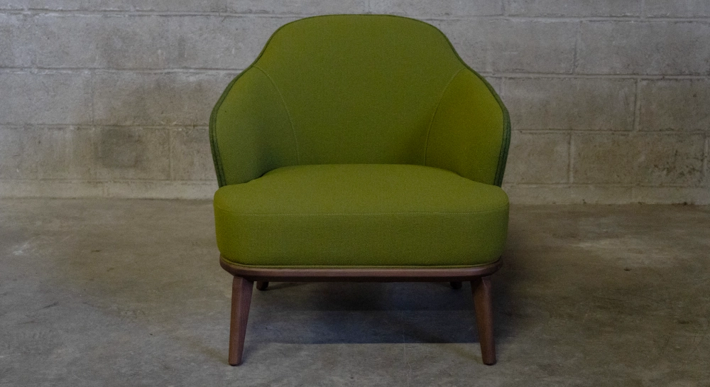 Fauteuil design tissu bi matière vert