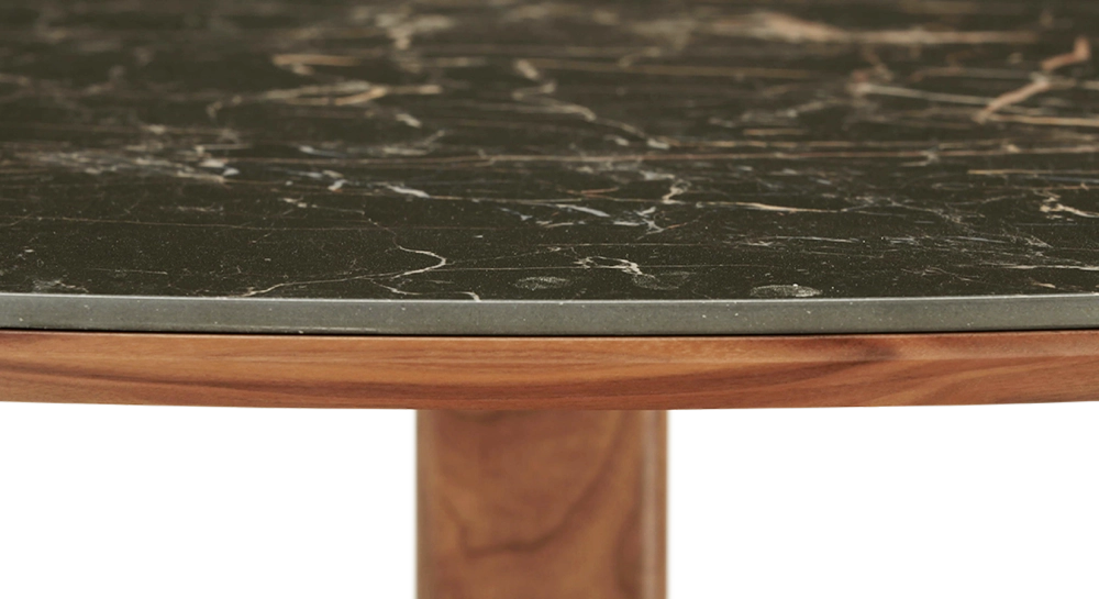 Round walnut and ceramic dining table for 4 to 6 people with a natural wood finish and a black m2 marble-effect ceramic top. 110x110 Round walnut and ceramic dining table for 4 to 6 people with a natural wood finish and a black m2 marble-effect ceramic top. 110x110
