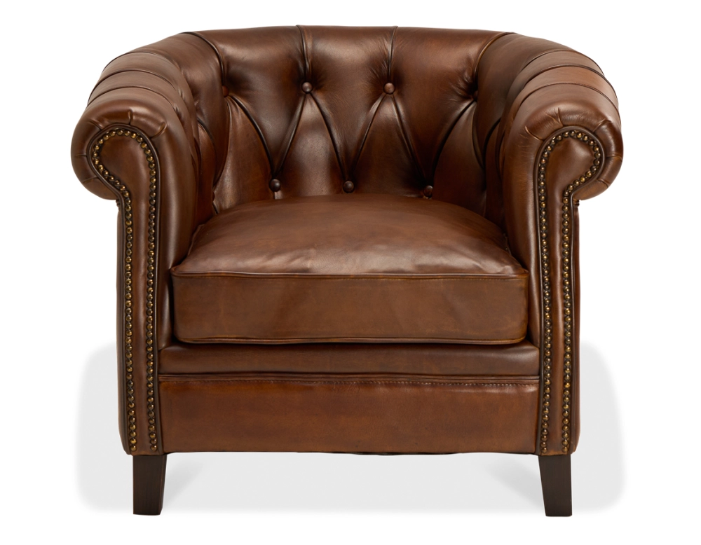 Fauteuil chesterfield cuir marron vintage accoudoirs cloutés Fauteuil chesterfield cuir marron vintage accoudoirs cloutés