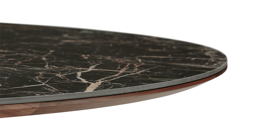 Round walnut and ceramic dining table for 4 to 6 people with a natural wood finish and a black m2 marble-effect ceramic top. 110x110 Round walnut and ceramic dining table for 4 to 6 people with a natural wood finish and a black m2 marble-effect ceramic top. 110x110