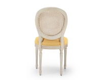 Louis XVI style antique chair white cerused wood with cane back and yellow fabric seat Louis XVI style antique chair white cerused wood with cane back and yellow fabric seat