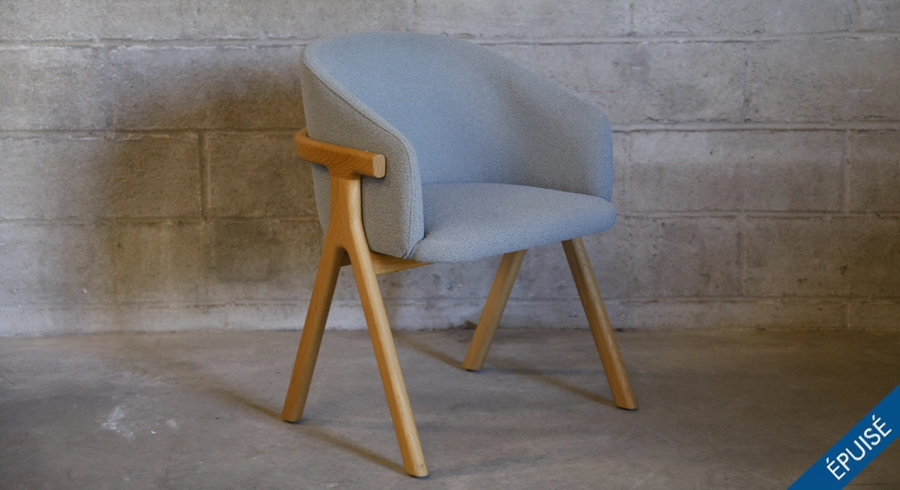 Oak chair design wood stained in xxxxx, seat upholstered in xxxxxx.