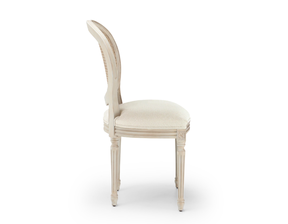 Louis XVI style antique chair wood with white cerused finish, caned backrest, and beige chevron fabric seat. Louis XVI style antique chair wood with white cerused finish, caned backrest, and beige chevron fabric seat.