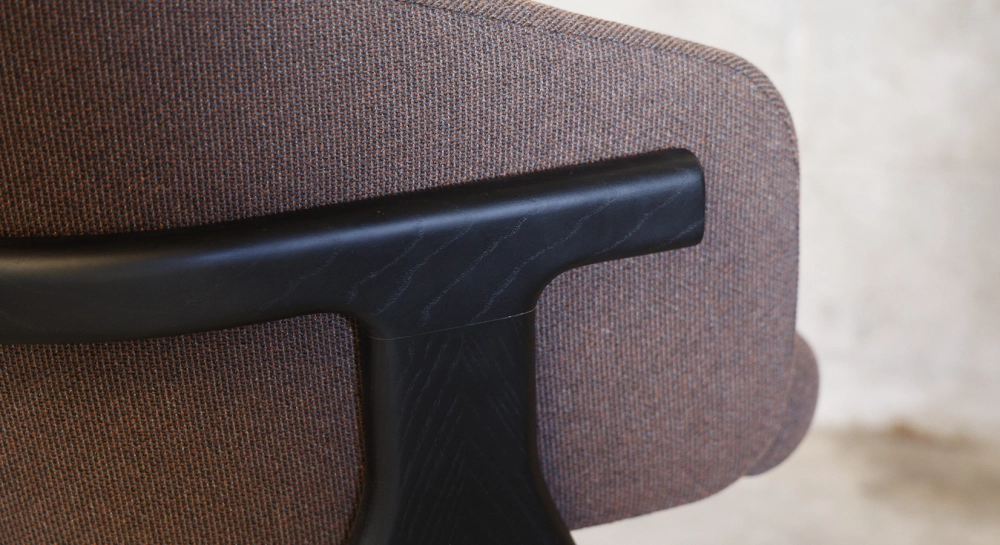 Oak chair design wood stained in xxxxx, seat upholstered in xxxxxx.