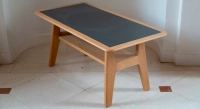 Square coffee table in oak and ceramic. with a natural wood finish and a white marble-effect ceramic top. 120x120 cm