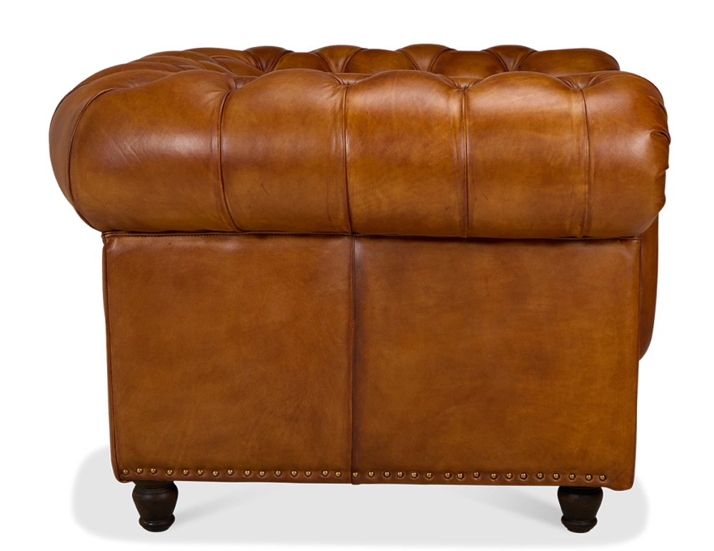 Fauteuil chesterfield cuir marron clair accoudoirs cloutés Fauteuil chesterfield cuir marron clair accoudoirs cloutés