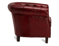 Sillón Chesterfield de piel rojo carmín reposabrazos con tachuelas