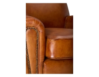 Leather club armchair light brown studded armrests Leather club armchair light brown studded armrests