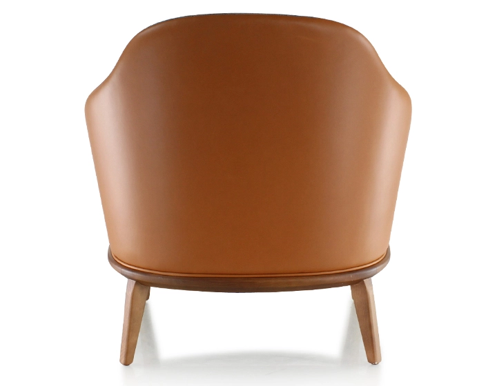 Fauteuil design cuir caramel et tissu brun Fauteuil design cuir caramel et tissu brun