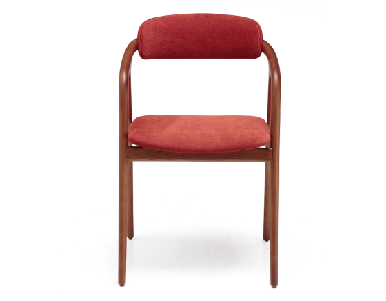 Scandinavian chair cherry wood stain, seat in beige burnt orange fabric.