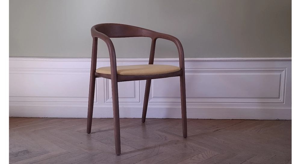 Scandinavian chair walnut wood with a pale yellow fabric seat Scandinavian chair walnut wood with a pale yellow fabric seat