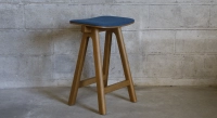 Design bar stool H65 cm natural wood finish with blue fabric seat