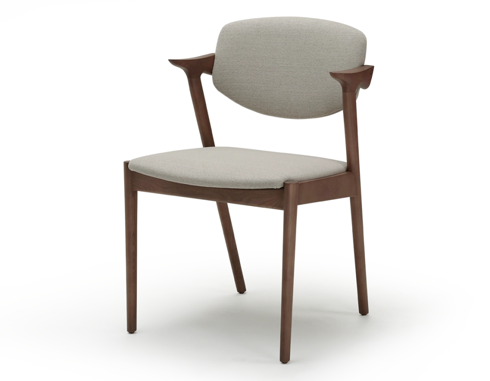 Walnut coloured design chair and natural beige fabric Walnut coloured design chair and natural beige fabric