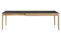 Extendable table for 8 to 12 people in oak and ceramic with ceramic extensions with natural stained wood and black marble effect ceramic top and extensions 180x100 cm