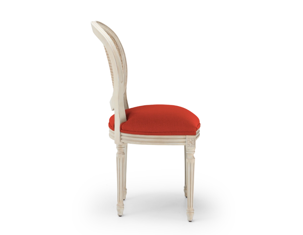 Louis XVI style antique chair wood with white cerused finish, caned backrest, and burnt orange fabric seat. Louis XVI style antique chair wood with white cerused finish, caned backrest, and burnt orange fabric seat.