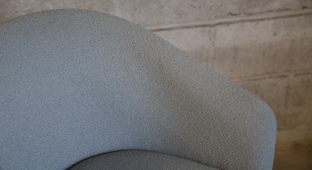 Oak chair design wood stained in xxxxx, seat upholstered in xxxxxx.