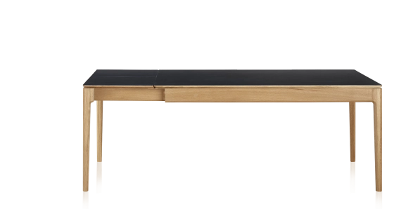 Extendable table for 8 to 12 people in oak and ceramic with ceramic extensions with natural stained wood and plain black ceramic top and extensions 160x100 cm