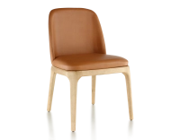 Designer chair natural stained wood and caramel leather Designer chair natural stained wood and caramel leather