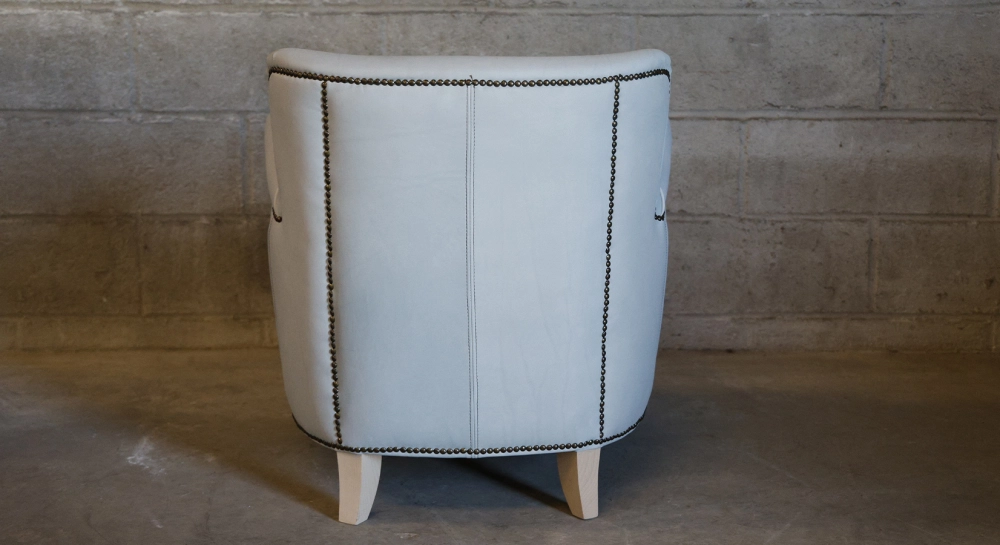 Leather club armchair dark brown studded armrests