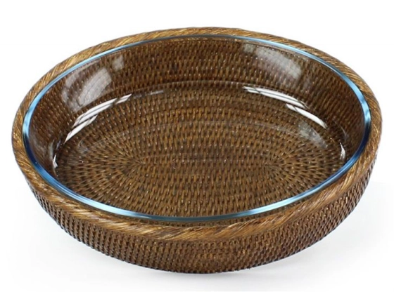 Very large oval pyrex dish with brown rattan stand