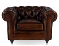 Fauteuil chesterfield cuir marron soutenu accoudoirs cloutés Fauteuil chesterfield cuir marron soutenu accoudoirs cloutés