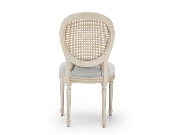 Louis XVI style antique chair wood with white cerused finish, caned backrest, light gray fabric seat.