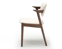 Scandinavian chair walnut-stained wood with off-white fabric seat. Scandinavian chair walnut-stained wood with off-white fabric seat.