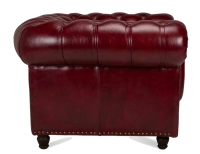 Sillón Chesterfield de piel rojo carmín reposabrazos con tachuelas