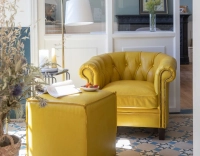 Chesterfield leather armchair yellow studded armrests Chesterfield leather armchair yellow studded armrests