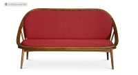 Scandinavian 2-seater sofa cherry wood stain and red fabric.