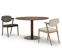 Scandinavian chair walnut-stained wood with forest green velvet seat. Scandinavian chair walnut-stained wood with forest green velvet seat.