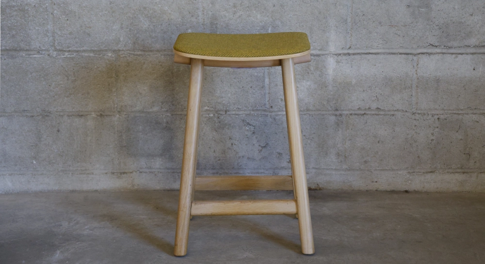 Design bar stool H65 cm natural wood finish with blue fabric seat