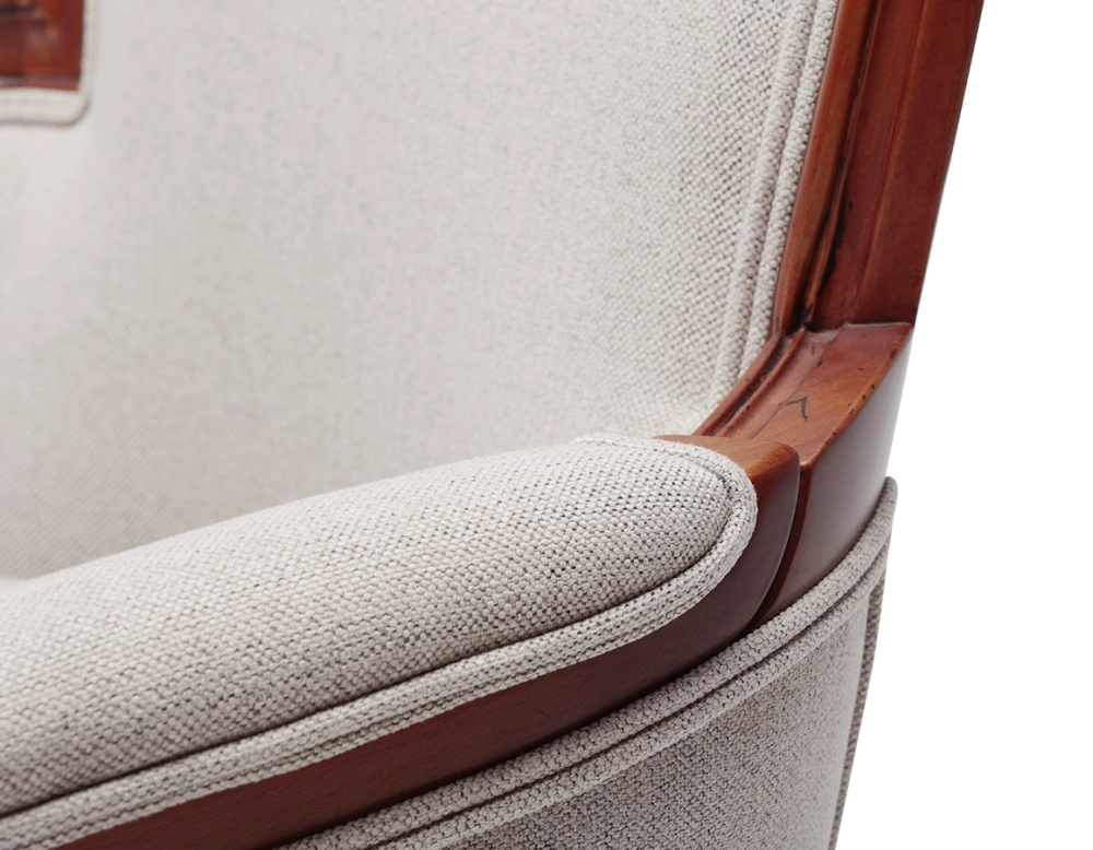 Louis XVI style moulded bergère armchair wood antique stain and natural beige fabric Louis XVI style moulded bergère armchair wood antique stain and natural beige fabric