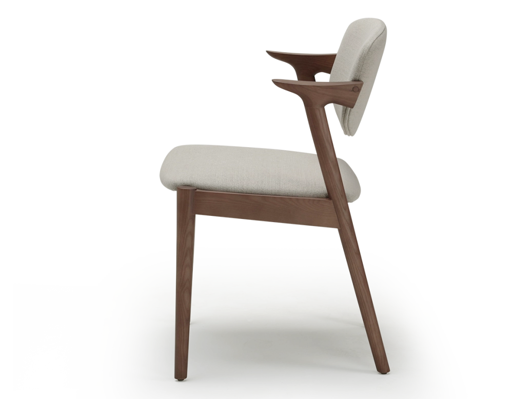 Walnut coloured design chair and natural beige fabric Walnut coloured design chair and natural beige fabric