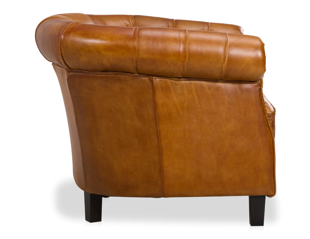 Chesterfield leather armchair cognac studded armrests Chesterfield leather armchair cognac studded armrests
