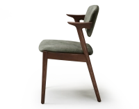 Scandinavian chair dark brown stained wood with forest green velvet seat. Scandinavian chair dark brown stained wood with forest green velvet seat.