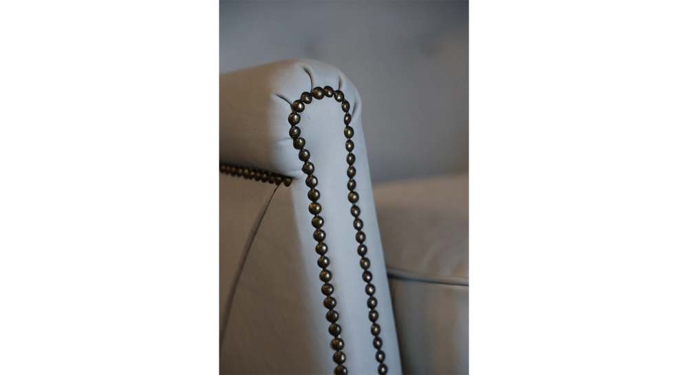 Leather club armchair dark brown studded armrests