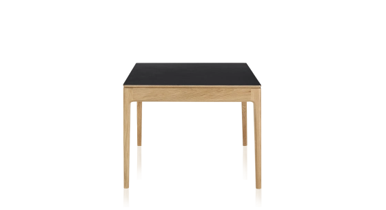 Oak and ceramic dining table for 6 people with natural stained wood and plain black ceramic top 180x90 cm