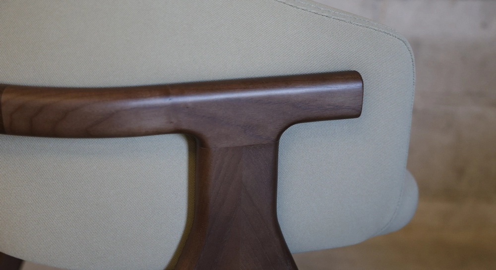 Oak chair design wood stained in xxxxx, seat upholstered in xxxxxx.