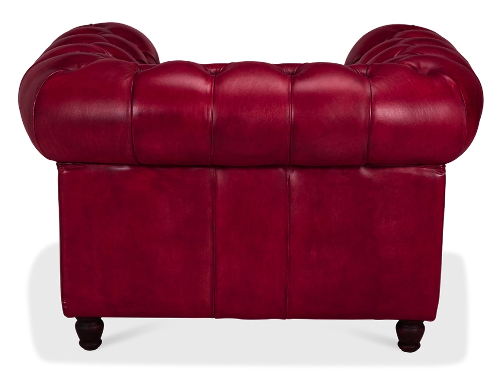 Fauteuil Chesterfield cuir rouge carmin accoudoirs cloutés Fauteuil Chesterfield cuir rouge carmin accoudoirs cloutés