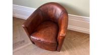 Lot de 2 fauteuils club cuir marron vintage Lot de 2 fauteuils club cuir marron vintage