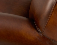 Leather club armchair vintage brown piped armrests Leather club armchair vintage brown piped armrests