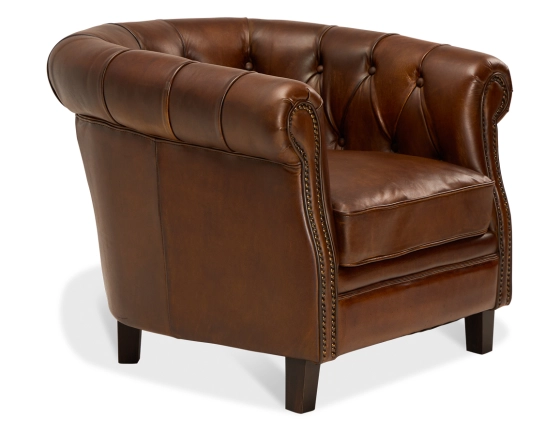 Fauteuil chesterfield cuir marron vintage accoudoirs cloutés