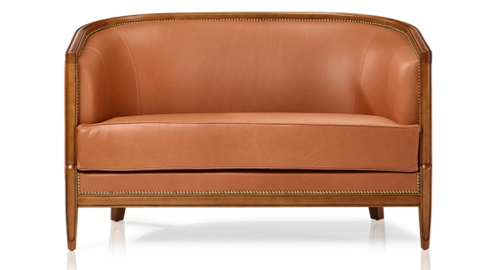 Antique 2 seater sofa with moulded armrests antique stained wood and chestnut leather