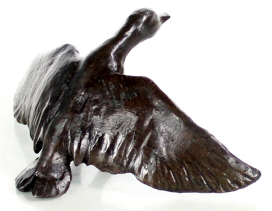 Bronze animal figure of a duck landing on water