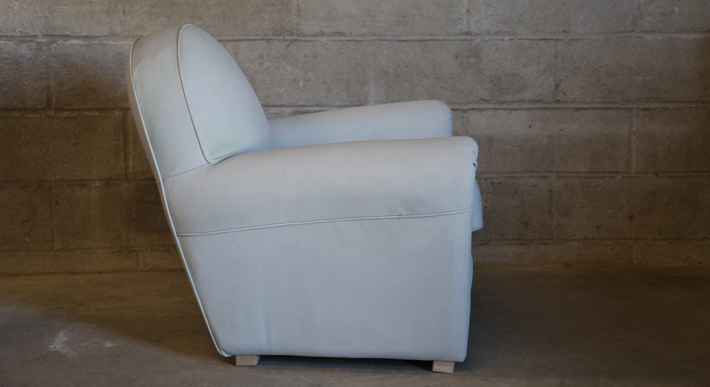 Leather club armchair dark brown studded armrests